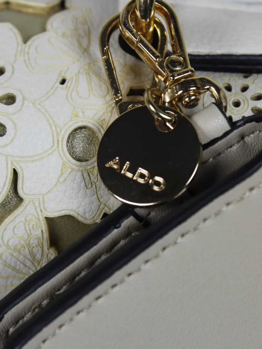 Aldo Beige Satchel Bag with Laser-Cut Floral Flap and Gold Chain